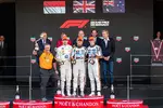 Foto zur News: Zak Brown, Charles Leclerc (Ferrari), Lando Norris (McLaren) und Oscar Piastri (McLaren)