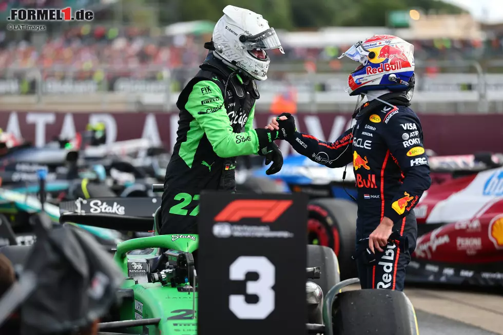 Foto zur News: Max Verstappen (Red Bull) und Nico Hülkenberg (Sauber)