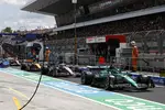 Foto zur News: Lance Stroll (Aston Martin), Pierre Gasly (Alpine) und Lando Norris (McLaren)