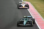 Foto zur News: Lance Stroll (Aston Martin) und Liam Lawson (Racing Bulls)