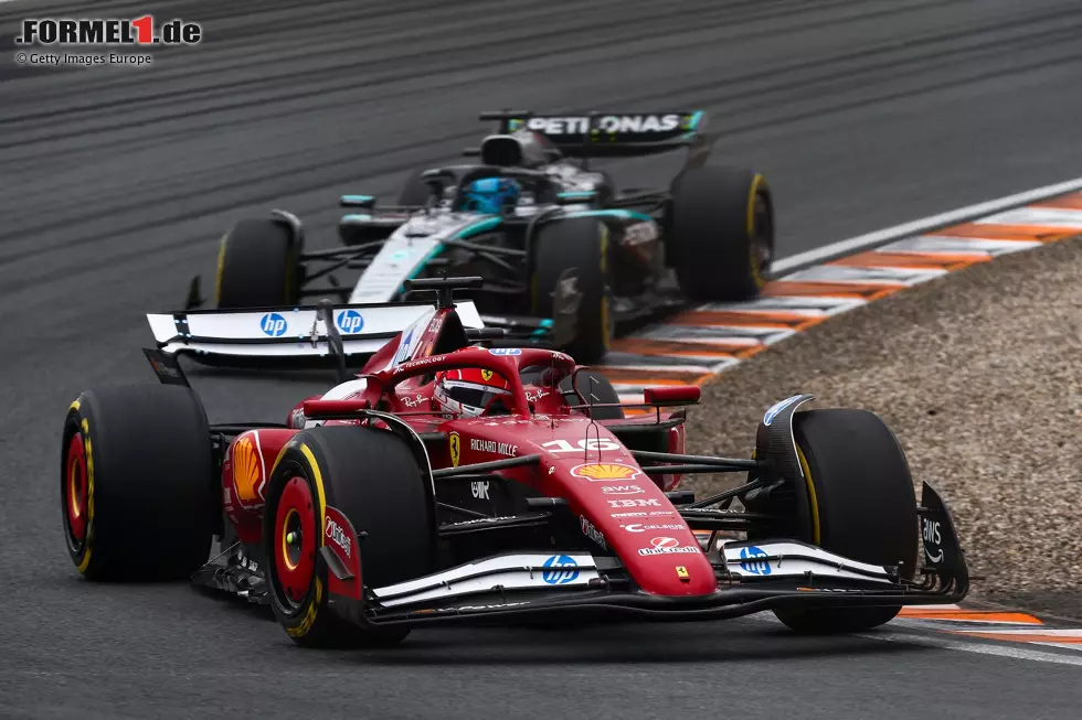 Foto zur News: Charles Leclerc (Ferrari) und George Russell (Mercedes)