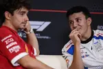 Foto zur News: Isack Hadjar (Racing Bulls) und Charles Leclerc (Ferrari)
