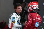Foto zur News: Lando Norris (McLaren) und Charles Leclerc (Ferrari)