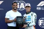 Foto zur News: Rome Flynn mit Lando Norris (McLaren)