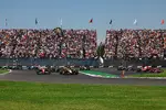 Foto zur News: Lando Norris (McLaren) und Charles Leclerc (Ferrari)