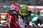 Foto zur News: Lando Norris (McLaren) und Charles Leclerc (Ferrari)