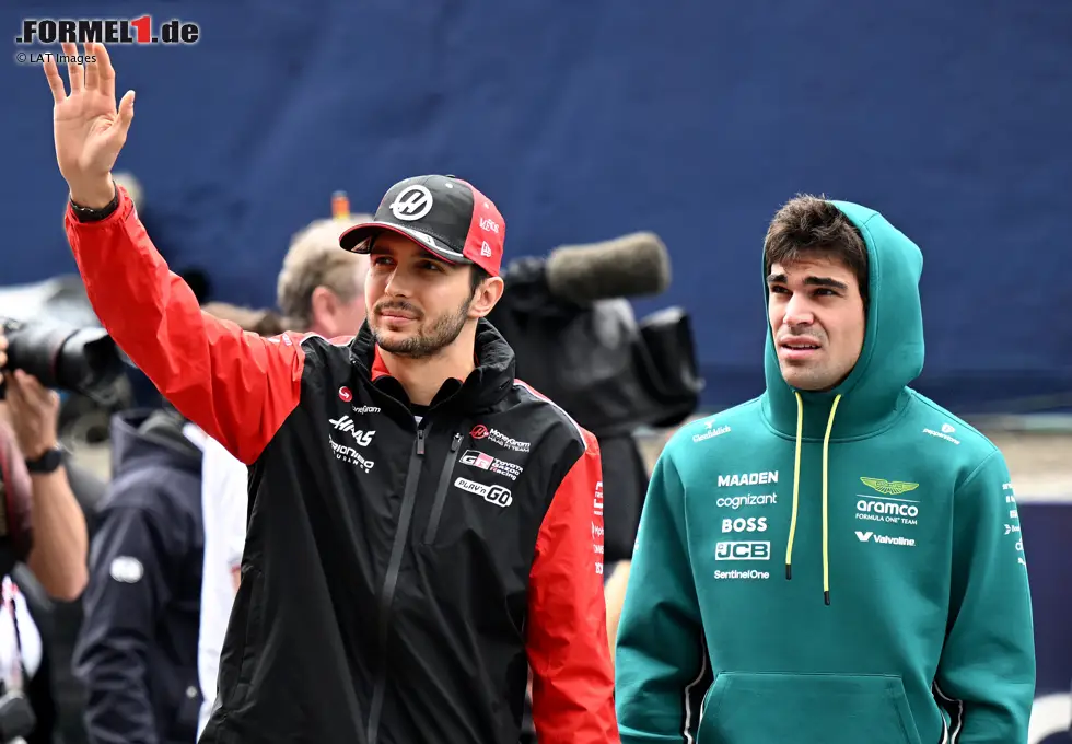 Foto zur News: Esteban Ocon (Haas) und Lance Stroll (Aston Martin)