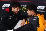 Foto zur News: Esteban Ocon (Haas) und Lando Norris (McLaren)