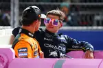 Foto zur News: Max Verstappen (Red Bull), Lando Norris (McLaren) und Mark Thompson