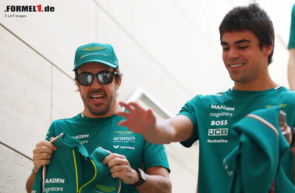 Foto zur News: Fernando Alonso (Aston Martin) und Lance Stroll (Aston Martin)