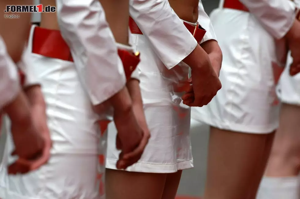 Foto zur News: Gridgirls in der Nahaufnahme.