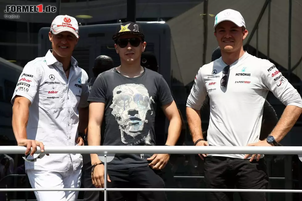 Foto zur News: Auf diesem Foto sind zehn WM-Titel zu sehen: Michael Schumacher, MotoGP-Champion Jorge Lorenzo und Nico Rosberg. Letzterer hat allerdings noch nicht einmal einen Grand Prix gewonnen.