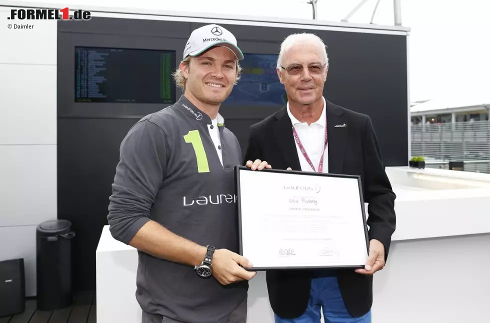 Foto zur News: Hohe Prominenz in Monza: Nico Rosberg mit "Kaiser" Franz Beckenbauer, ...