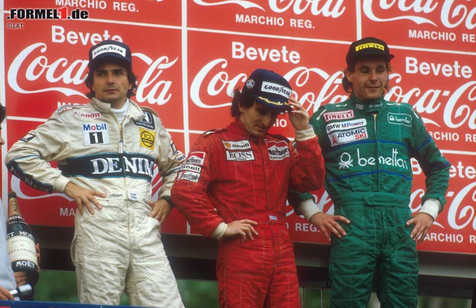 Foto zur News: Imola 1986: Bergers drittes Rennen für Benetton bringt den ersten Podestplatz seiner Formel-1-Karriere. Hinter Alain Prost (McLaren) und Nelson Piquet (Williams) bringt der Österreicher seinen B186 als Dritter ins Ziel. Kurz vor Schluss lässt er sich bewusst von Prost überrunden, um so eine Runde weniger fahren zu müssen. Zahlreiche Konkurrenten probieren die volle Distanz und rollen ohne Sprit aus...