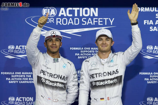 Foto zur News: "Tony, ganz im Ernst jetzt - sei etwas enthusiastischer, bitte!" Rosberg holt die Pole-Position beim Saisonfinale, gewinnt das Qualifying-Stallduell 2014 mit 12:7 und macht dem drittplatzierten Valtteri Bottas ein unmoralisches Angebot: "Ich bezahle ihm h