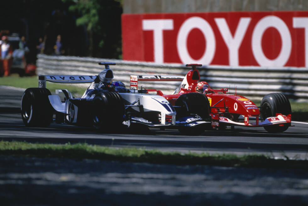 Foto zur News: Die schnellste Durchschnittsgeschwindigkeit in einem Rennen hat Michael Schumacher aufgestellt. 2003 gewann er auf Ferrari mit einem Mittel von 247,6 km/h. Mit 1:14:19.838 Stunden war Monza 2003 auch das kürzeste Formel-1-Rennen aller Zeiten, das über die volle Distanz ging.