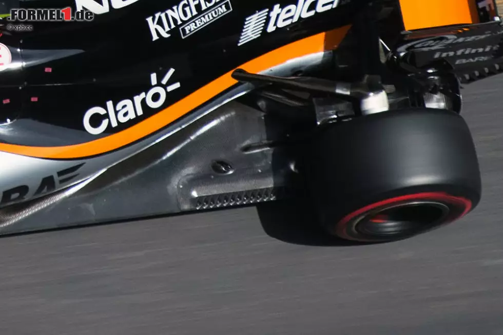 Foto zur News: Force India setzt auf 16 neue Schlitze an den Oberseiten-Flanken des Unterbodens. Ziel ist, den von den Reifen erzeugten Luftverwirbelungen entgegenzuwirken, um die Effizienz des Diffusors zu maximieren.