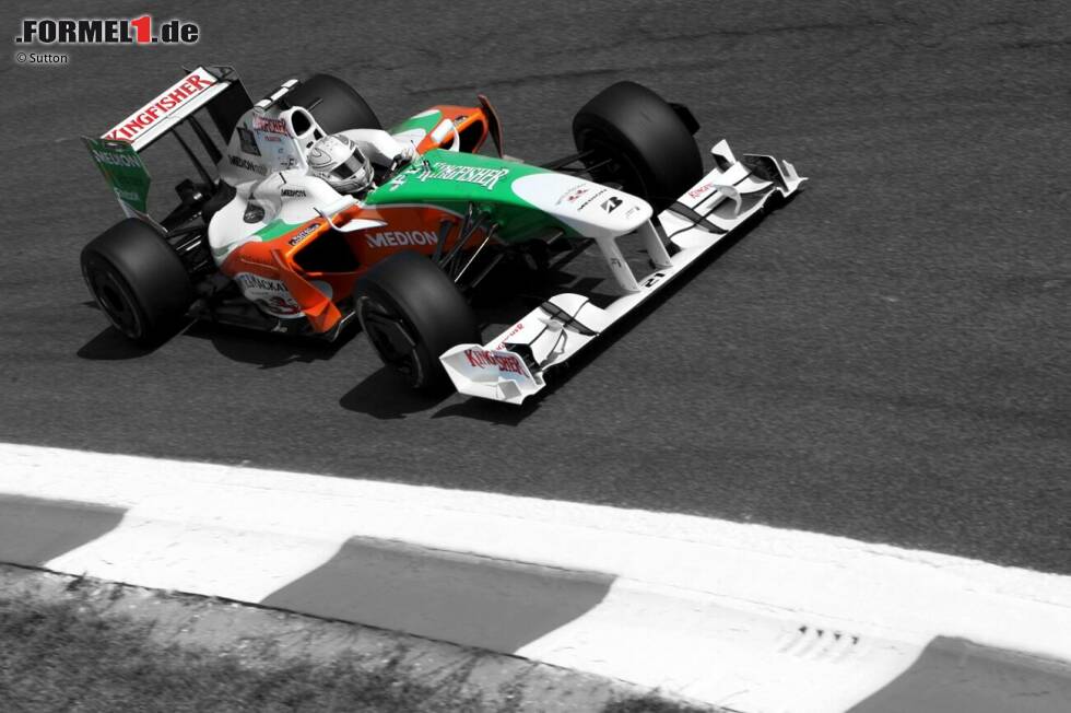 Foto zur News: Mit dem Force India VJM02 fährt Giancarlo Fisichella 2009 in Spa überraschend auf die Pole-Position und im Rennen auf Platz zwei.
