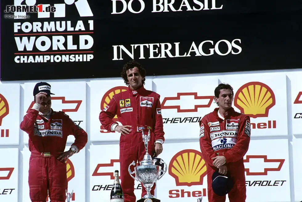 Sao Paulo 1990: Prost steht auch für Ferrari bei seiner ersten Zielankunft ganz oben auf dem Treppchen, und wieder in Brasilien - es ist jedoch bereits sein zweiter Grand Prix für das Team aus Maranello. In zwei Saisons gelingen ihm bis Ende 1991 insgesamt 14 Top-3-Platzierungen für Ferrari. Foto zur News: Sao Paulo 1990: Prost steht auch für Ferrari bei seiner ersten Zielankunft ganz oben auf dem Treppchen, und wieder in Brasilien - es ist jedoch bereits sein zweiter Grand Prix für das Team aus Maranello. In zwei Saisons gelingen ihm bis Ende 1991 insgesamt 14 Top-3-Platzierungen für Ferrari.
