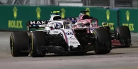 Foto zur News: Sergio Perez beteuert: Habe Sirotkin nicht mit Absicht gerammt!