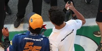 Foto zur News: McLaren-Feierlichkeiten in Monza: Lando Norris verletzt sich an der Hand