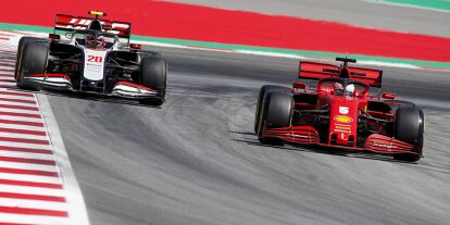 Foto zur News: Sebastian Vettel, Kevin Magnussen