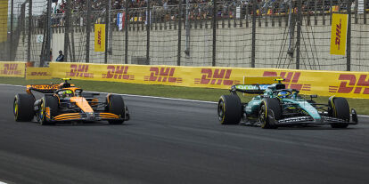 Foto zur News: Fernando Alonso, Lando Norris