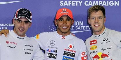 Foto zur News: Pastor Maldonado, Lewis Hamilton und Sebastian Vettel
