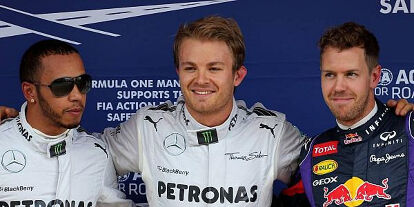 Foto zur News: Lewis Hamilton, Nico Rosberg, Sebastian Vettel
