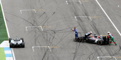 Foto zur News: Nico Rosberg, Adrian Sutil