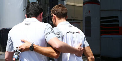 Foto zur News: Eric Boullier, Jenson Button