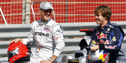 Foto zur News: Michael Schumacher, Sebastian Vettel