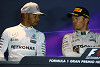 Foto zur News: Vettel #AND# Rosberg: Immer Ärger mit der falschen Kappe...