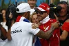 Foto zur News: Sebastian Vettel und Lewis Hamilton: Helmtausch der Stars!