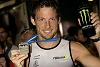 Foto zur News: Button über seine Triathlon-Leidenschaft