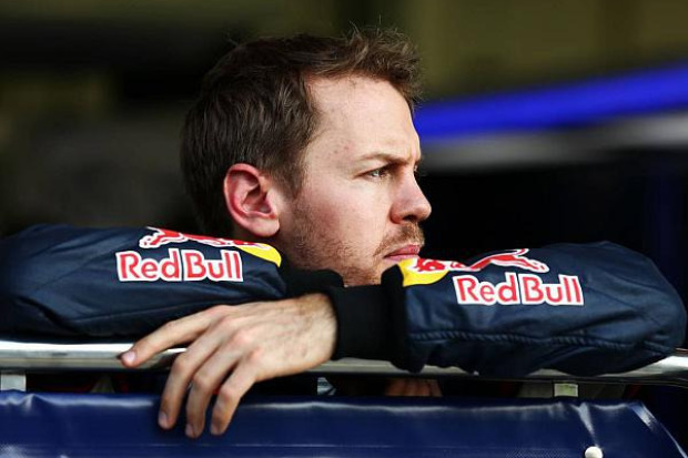 Foto zur News: Gedemütigter Rebell: Vettel mimt den tapferen Wasserträger