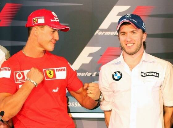 Michael Schumacher, Nick Heidfeld Michael Schumacher, Nick Heidfeld