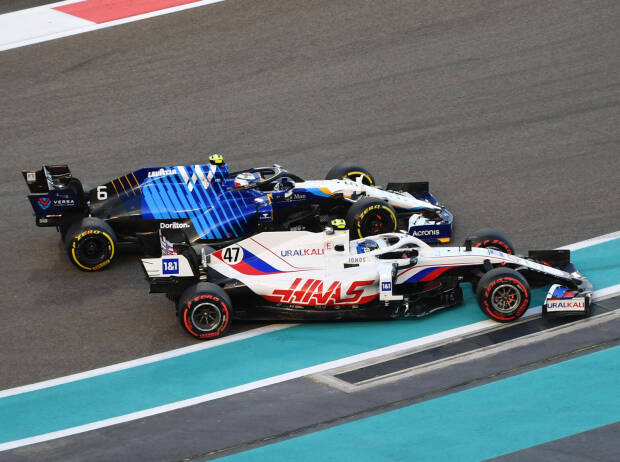 Mick Schumacher (Haas) und Nicholas Latifi (Williams) kämpfen während des Formel-1-Rennens von Abu Dhabi 2021 Mick Schumacher (Haas) und Nicholas Latifi (Williams) kämpfen während des Formel-1-Rennens von Abu Dhabi 2021