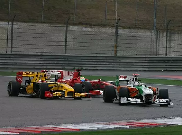 Foto zur News: McLaren weltmeisterlich: Doppelsieg im Regenchaos!