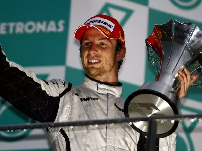 Jenson Button Foto zur News: Der legendäre Malaysia-GP 2009: Button gewinnt stehend, Räikkönen isst Eis