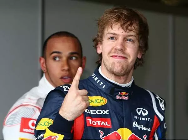 Lewis Hamilton und Sebastian Vettel Foto zur News: Weltmeisterlich: Vettel fährt überlegen auf Pole!
