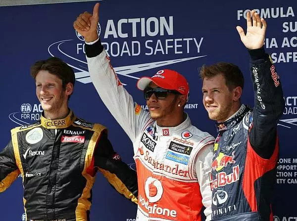 Romain Grosjean, Lewis Hamilton, Sebastian Vettel Foto zur News: 150. Pole-Position für McLaren: Hamilton souverän