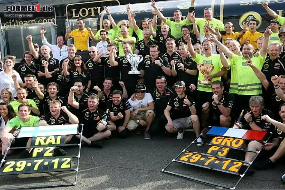 Foto zur News: Kimi Räikkönen, Eric Boullier (Lotus-Teamchef), Romain Grosjean