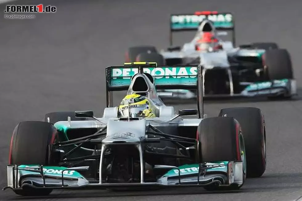 Foto zur News: Nico Rosberg, Michael Schumacher