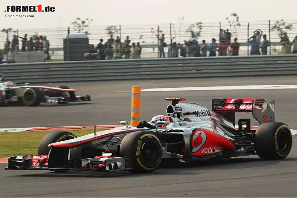 Foto zur News: Jenson Button, Lewis Hamilton