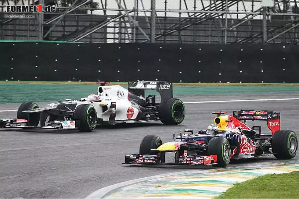 Foto zur News: Kamui Kobayashi, Sebastian Vettel