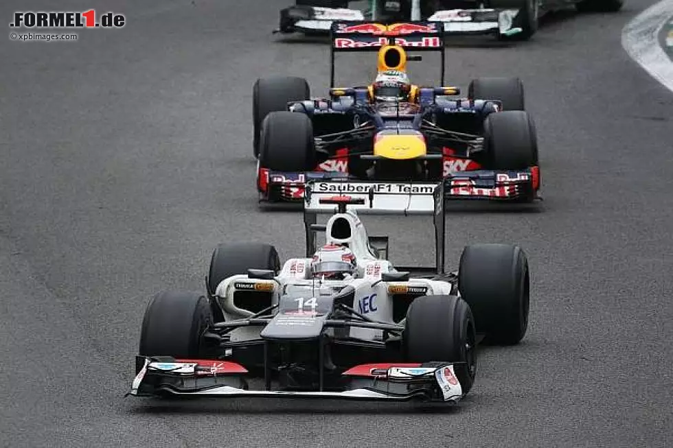 Foto zur News: Sebastian Vettel, Kamui Kobayashi