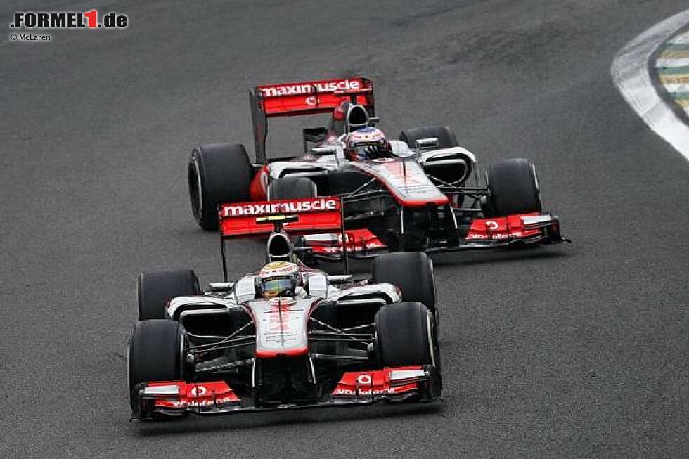 Foto zur News: Jenson Button, Lewis Hamilton