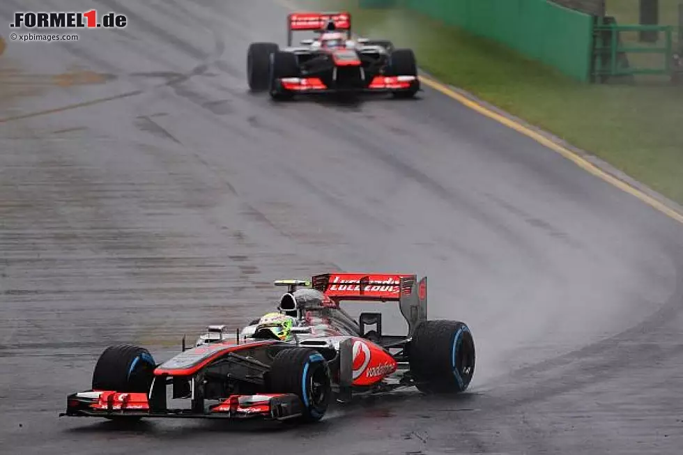 Foto zur News: Sergio Perez, Jenson Button