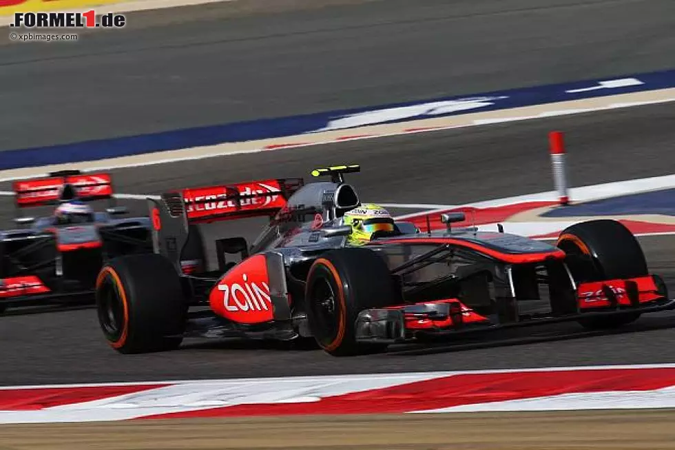 Foto zur News: Sergio Perez, Jenson Button
